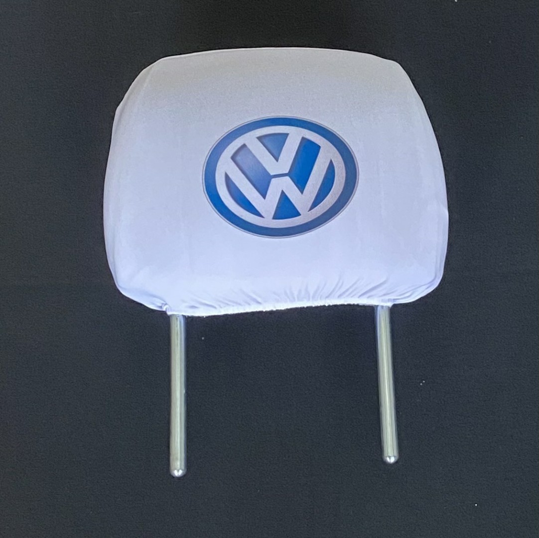Biele návleky na opierky hlavy s logom Volkswagen